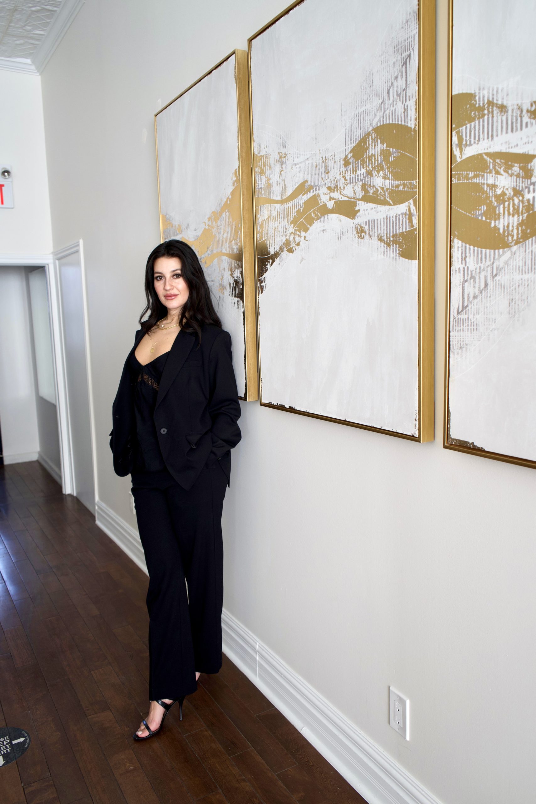 Tatiana standing inside Tatiana Hair salon, ready to deliver expert hair colour, balayage, and blonde services to clients at Toronto’s top salon.