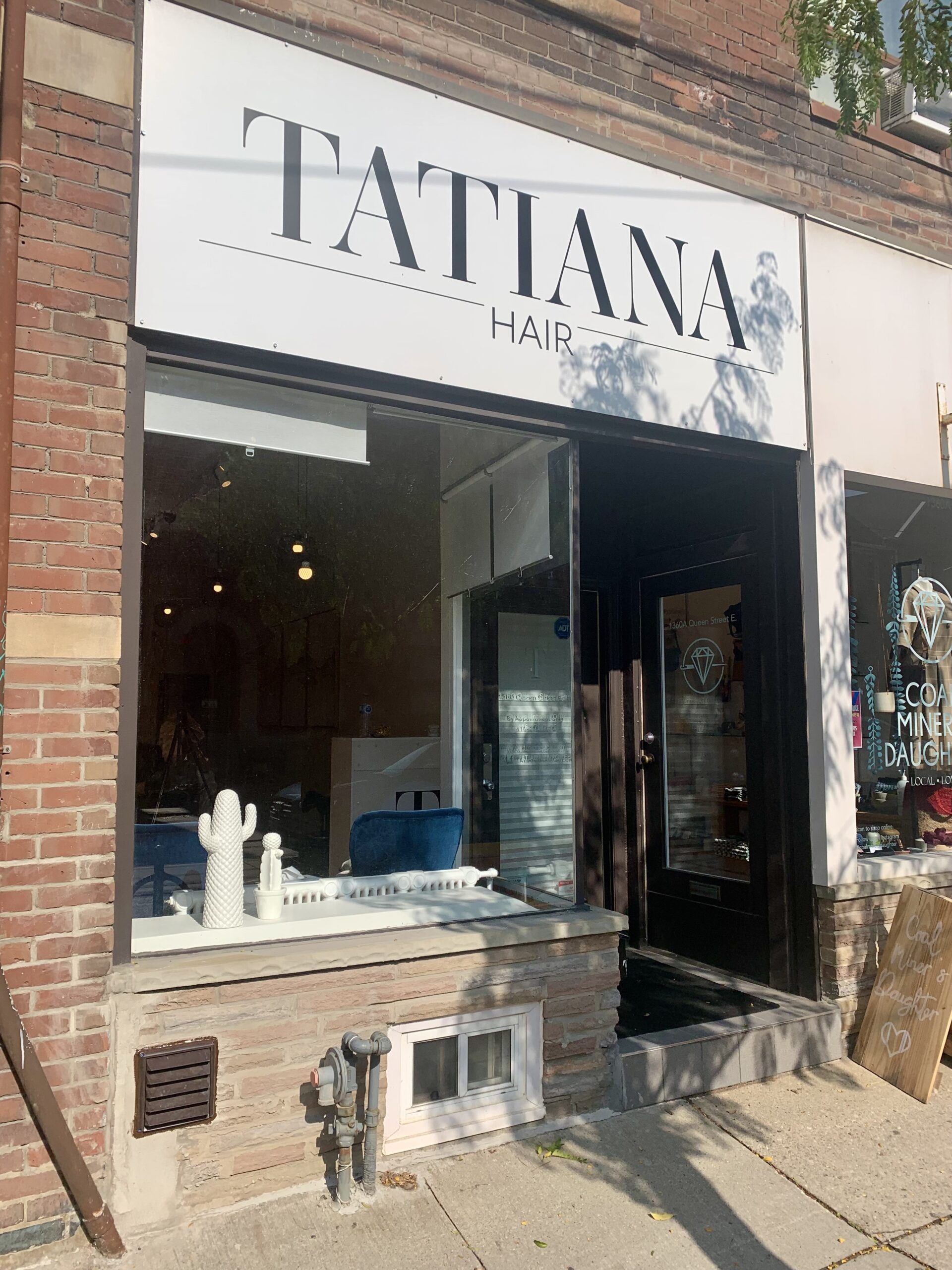 Exterior of Tatiana Hair Salon, a private hair studio in Leslieville, Toronto, specializing in balayage and blonde transformations.